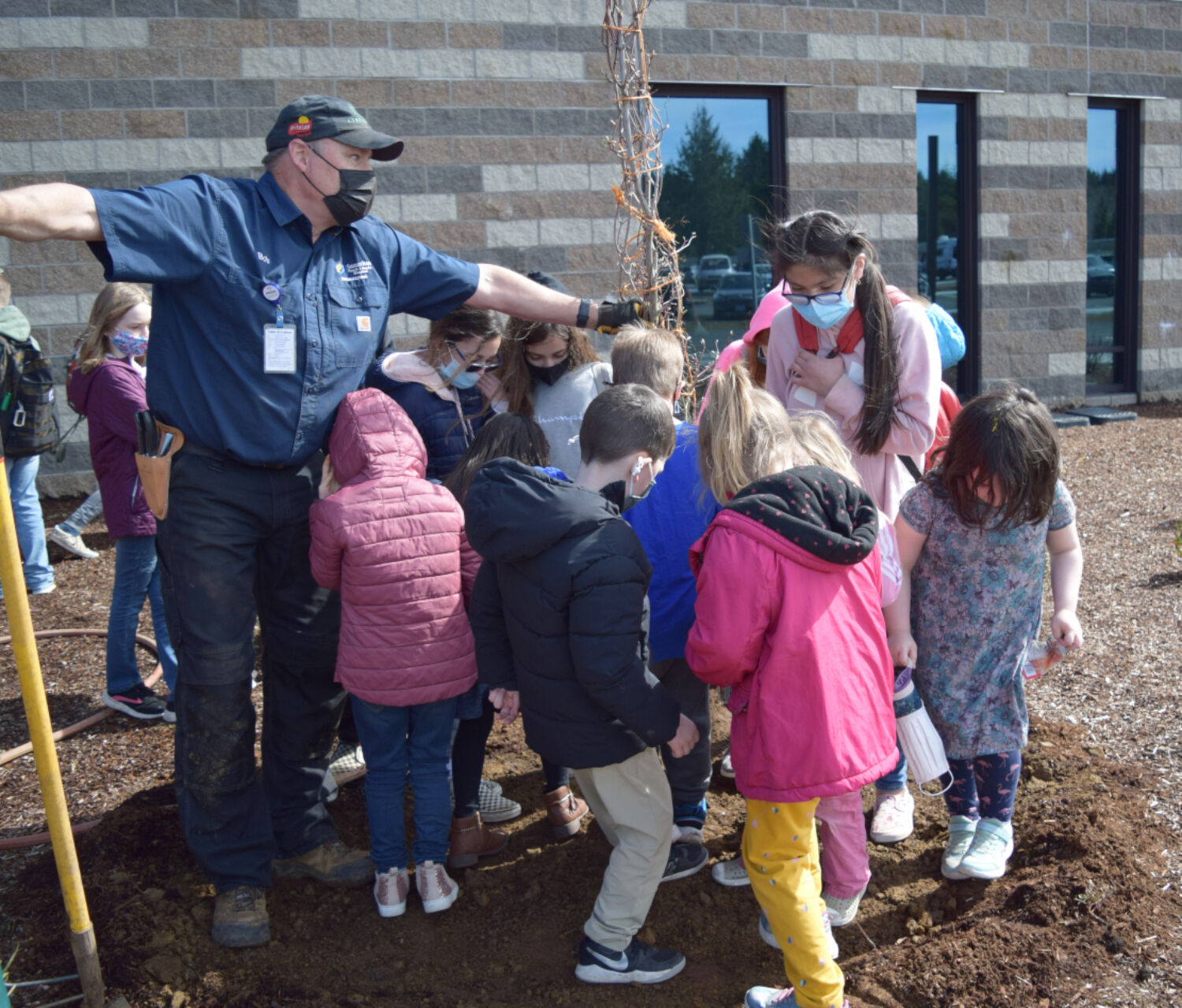Children compacting soil (1).jpg